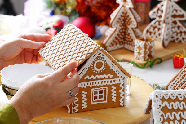 Making Christmas cookie house Stock Photo 03