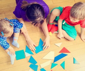 Mothers play games with their children Stock Photo