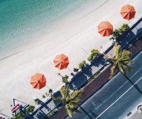 Overhead umbrellas on the beach Stock Photo