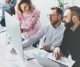 People in the office using computers Stock Photo 03