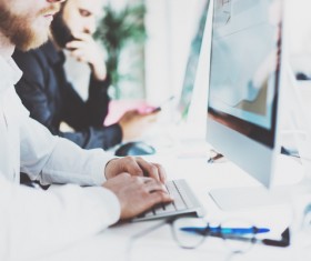 People in the office using computers Stock Photo 04
