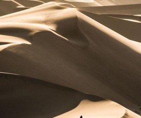 People walking in the desert Stock Photo