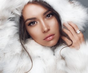 Red eye shadow makeup of the girl wearing a fur coat Stock Photo 04