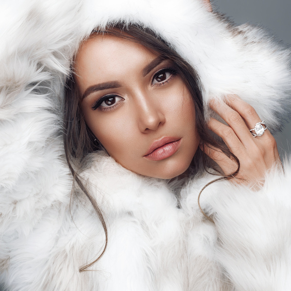 Red eye shadow makeup of the girl wearing a fur coat Stock Photo 04
