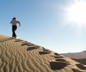 Running woman in the desert Stock Photo 03