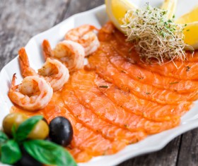 Sashimi with lemon olives Stock Photo