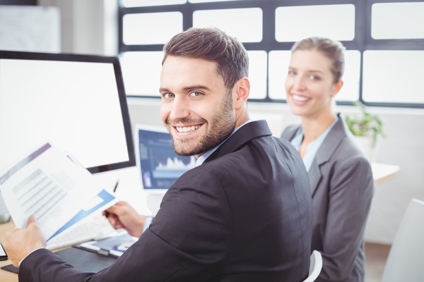 Smiling office worker Stock Photo