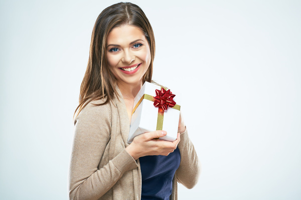 Smiling woman holding gift box Stock Photo 02