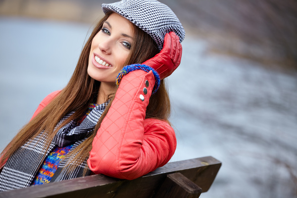 Smiling woman in red jacket Stock Photo 01