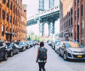 Street female backpackers Stock Photo