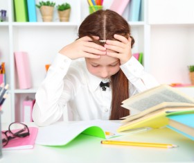 Students staring at homework Stock Photo