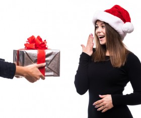 Surprise girl received Christmas gift Stock Photo
