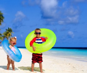 The brother and sister on the beach Stock Photo