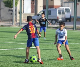 The children who play football Stock Photo