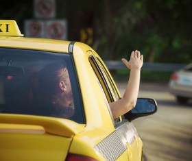 The girl who looks at the sun in Taxi Stock Photo 02