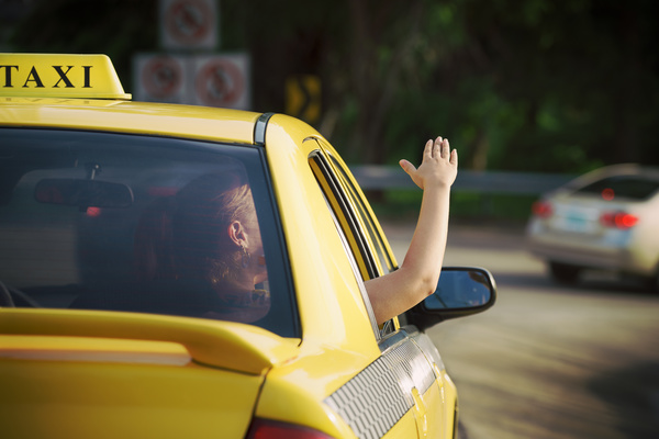 The girl who looks at the sun in Taxi Stock Photo 02