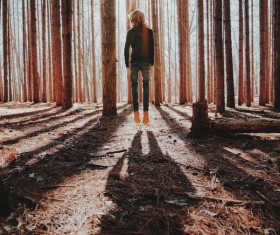 The leaping man in the woods Stock Photo