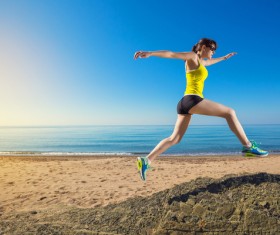The woman running on the beach Stock Photo 04