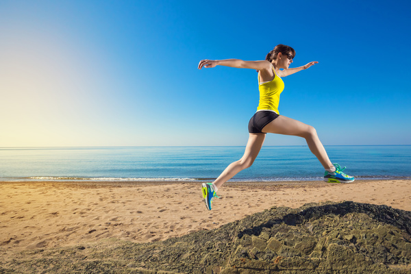 The woman running on the beach Stock Photo 04