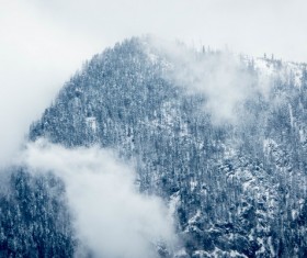 Thick fog on mountain landscape Stock Photo