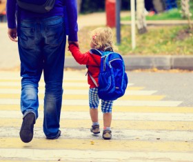 Through the father and daughter of the zebra crossing Stock Photo