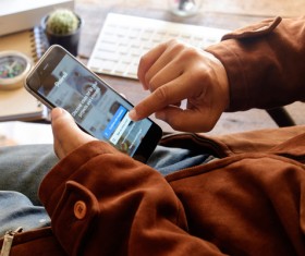 Use Social Media Apps on iPhone Stock Photo 04