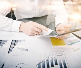 Use tablet to do business data analysis Stock Photo 04