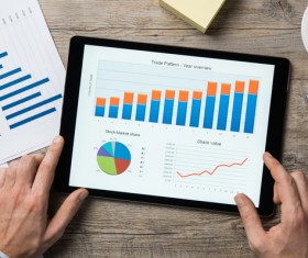 Use tablet to do business data analysis Stock Photo 06