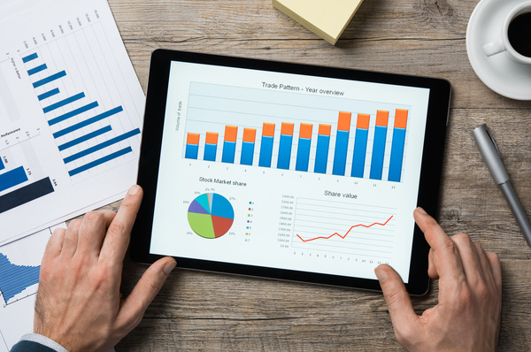 Use tablet to do business data analysis Stock Photo 06