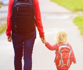 Walking mother and daughter Stock Photo