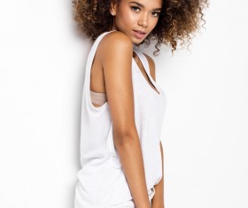 Wear cool clothing fluffy short curly hair young woman Stock Photo 05