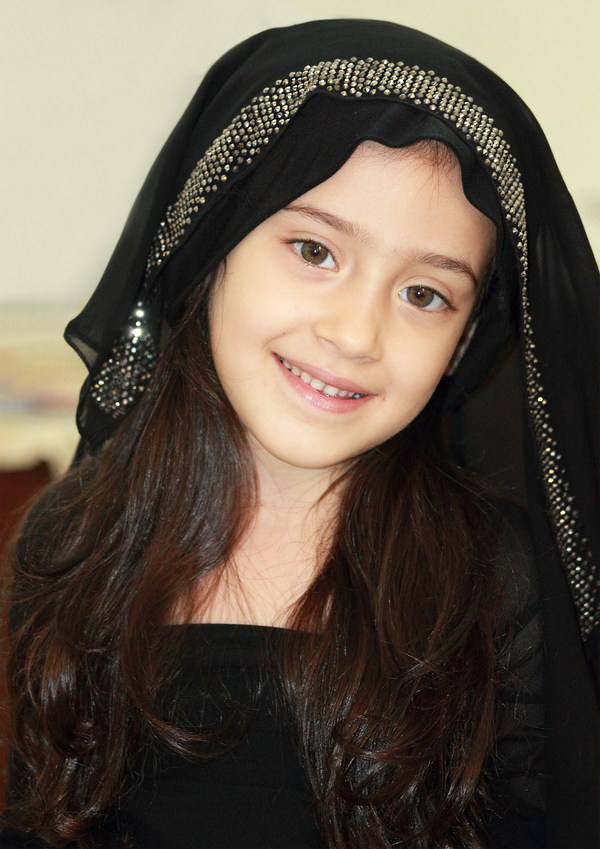 Wearing black veil beautiful little girl Stock Photo