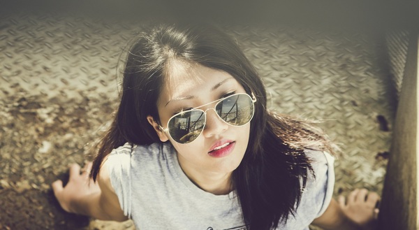 Wearing sunglasses girl Stock Photo