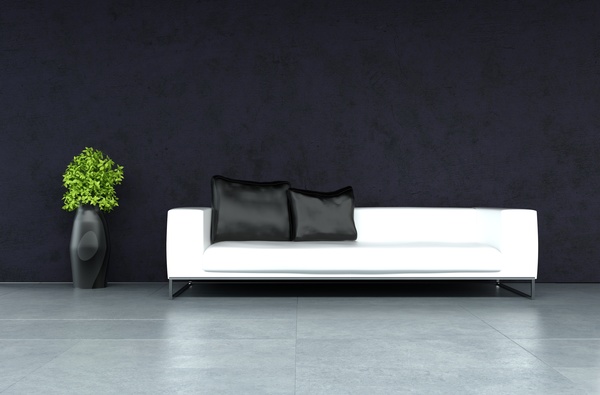 White sofa with black cushions Stock Photo