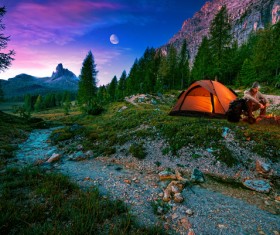 Wild camping man Stock Photo