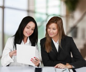 Women learning from each other Stock Photo