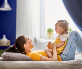 Young mother and kids play games Stock Photo
