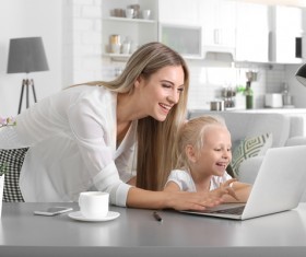 Young mother with daughter at home Stock Photo 02
