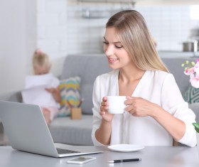 Young mother with daughter at home Stock Photo 04