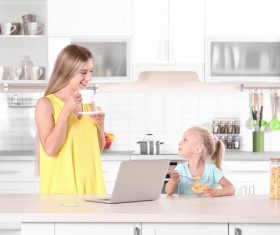 Young mother with daughter at home Stock Photo 06
