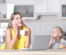 Young mother with daughter at home Stock Photo 07
