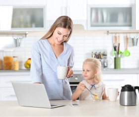Young mother with daughter at home Stock Photo 09