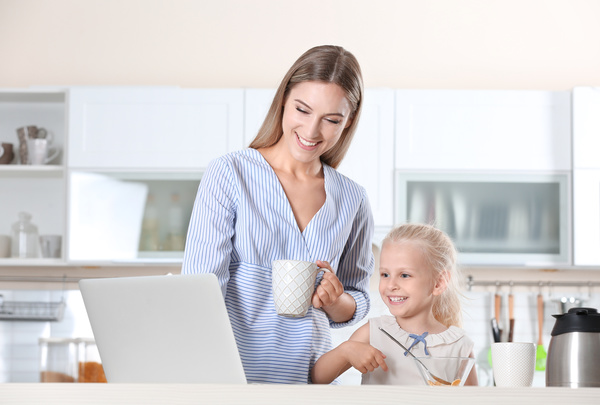 Young mother with daughter at home Stock Photo 10