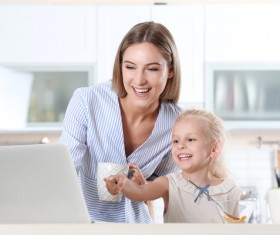 Young mother with daughter at home Stock Photo 11