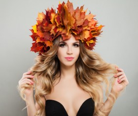 girl wearing red maple leaf wreath Stock Photo 01