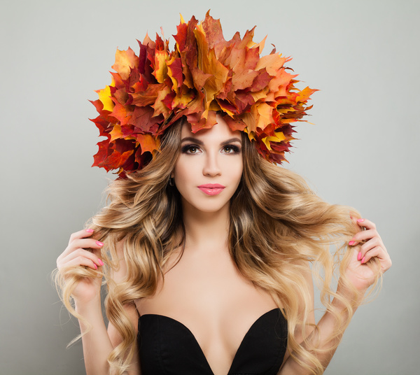girl wearing red maple leaf wreath Stock Photo 01