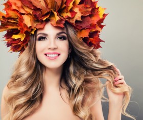 girl wearing red maple leaf wreath Stock Photo 02
