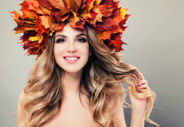 girl wearing red maple leaf wreath Stock Photo 02