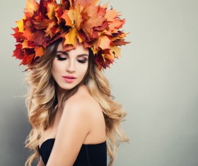 girl wearing red maple leaf wreath Stock Photo 04