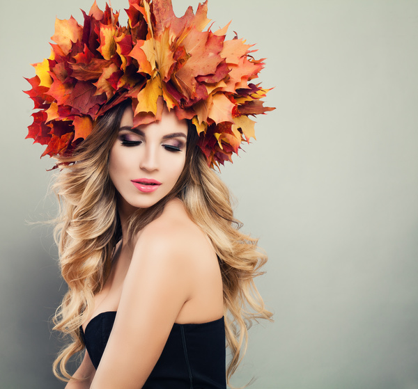 girl wearing red maple leaf wreath Stock Photo 04